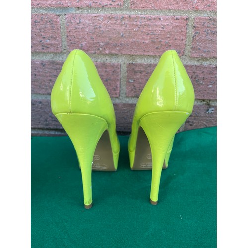 367 - Pair of lime green high heels