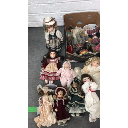 490 - THREE BOXES OF COLLECTABLE DOLLS SEE ALL PICTURES