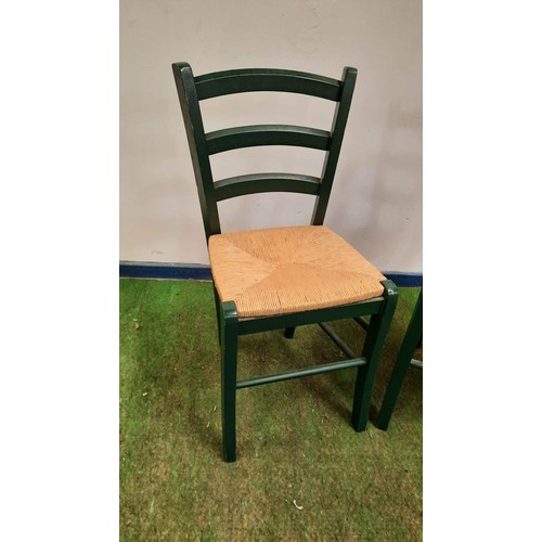 129 - TWO LADDER BACK CHAIRS