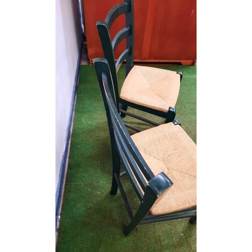 129 - TWO LADDER BACK CHAIRS