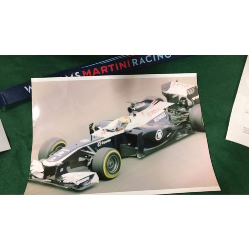 324a - Formula 1 memorabilia including part of a crashed Williams car ( see all pictures )