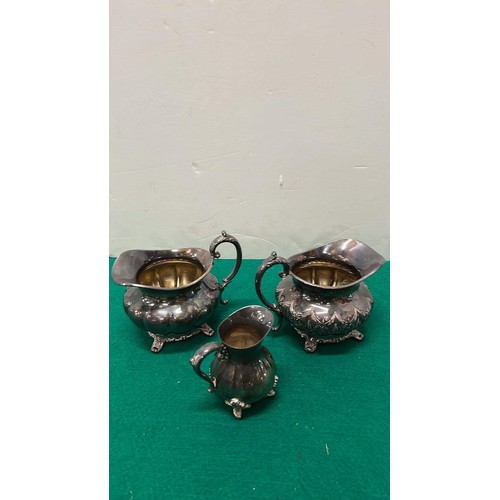 49 - Silver plate jugs...