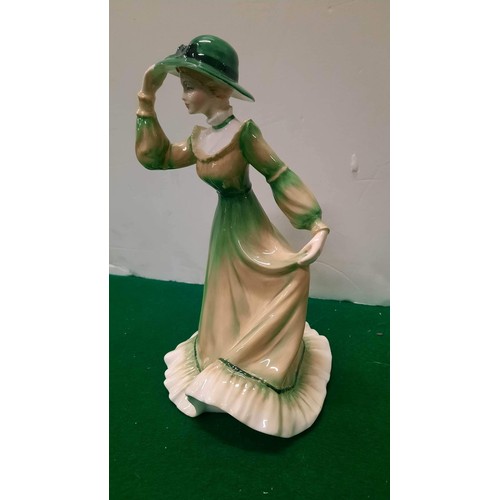 14 - Royal Grafton female figure in green dress has chip to hat...