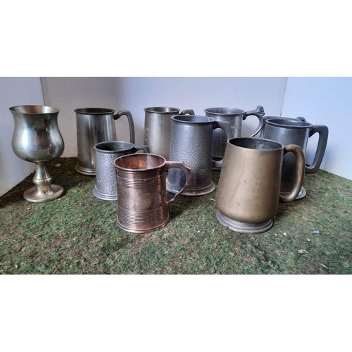 9 - Metal tankards...