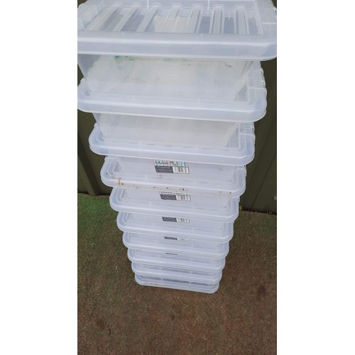 740 - Ten plastic storage boxesL-31 CM. D-20 CMH-10 CM