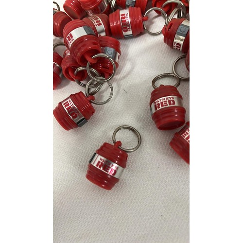 19 - Watney red barrell key rings...