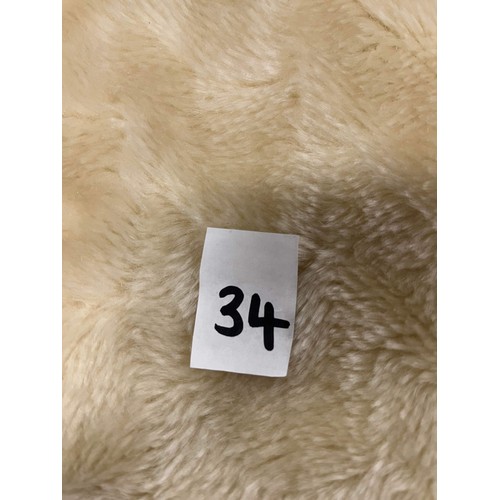 34 - Cream fluffy blanket