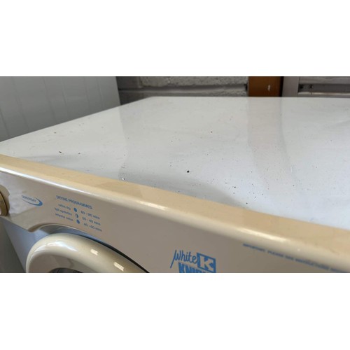 445 - SMALL WHITE KNIGHT TUMBLE DRYER WAS USED IN GARAGE HAS SMALL DENT TO TOP