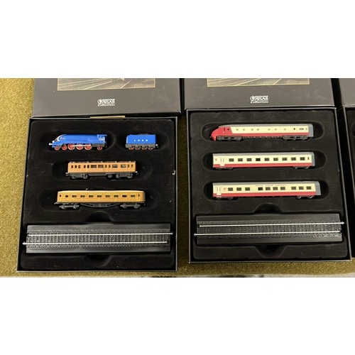 325 - FIVE BOXED MINIATURE TRAIN SETS AND CUFF LINKS