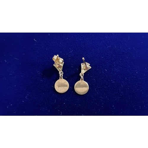 219 - 9ct gold earrings - weight 1.41g