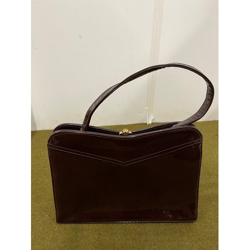 385 - Brown patent Holmes of Norwich handbag grosgrain lined