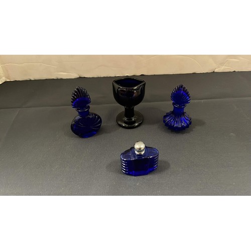 5 - BLUE PERFUME BOTTLES AND EYE WASH