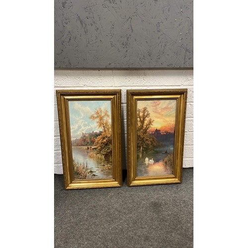 394 - TWO GOLD COLOURED FRAMED ART WORK PRINTS SIGNED