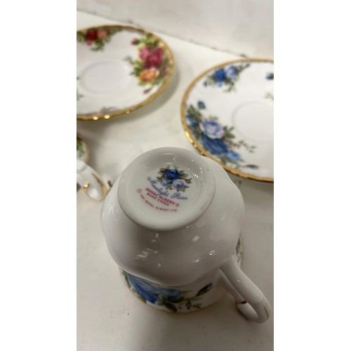 534 - ROYAL ALBERT  TEA AND COFFEE CUPS WITH SAUCERS