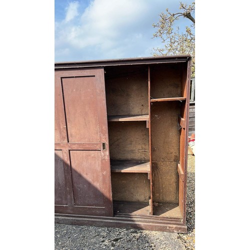 67 - LARGE PINE SCHOOL CUPBOARD WITH SLID DOORS