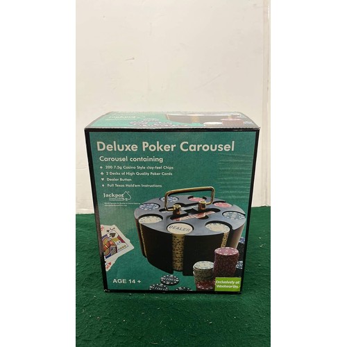 1 - BOX WITH SEALED DELUX POKER CAROUSEL CONTAINING CHIPS