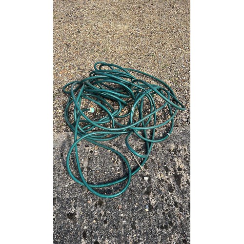 38 - GREEN GARDEN HOSE PIPE