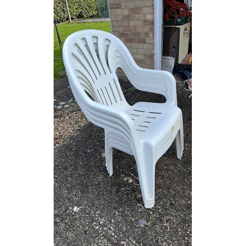 46 - FOUR WHITE PLASTIC GARDEN CHAIRS