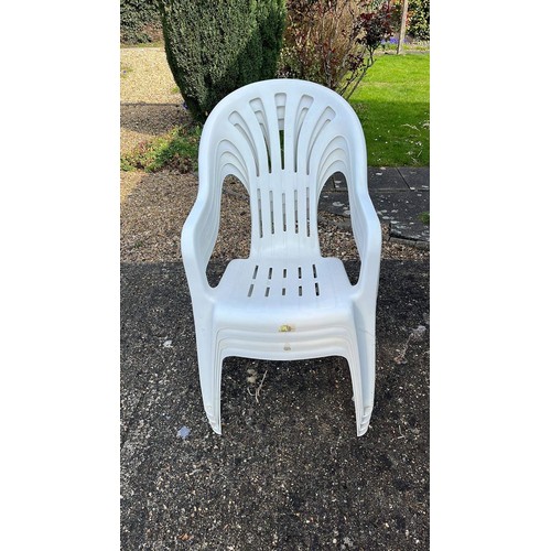 46 - FOUR WHITE PLASTIC GARDEN CHAIRS