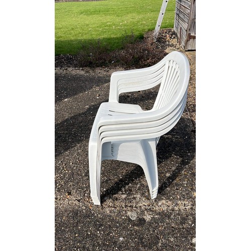 47 - FOUR WHITE PLASTIC GARDEN CHAIRS