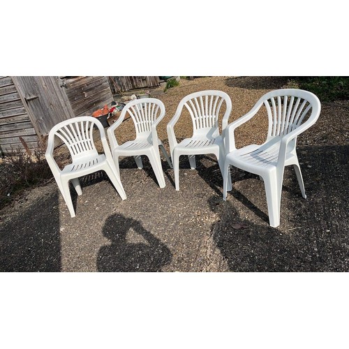 47 - FOUR WHITE PLASTIC GARDEN CHAIRS