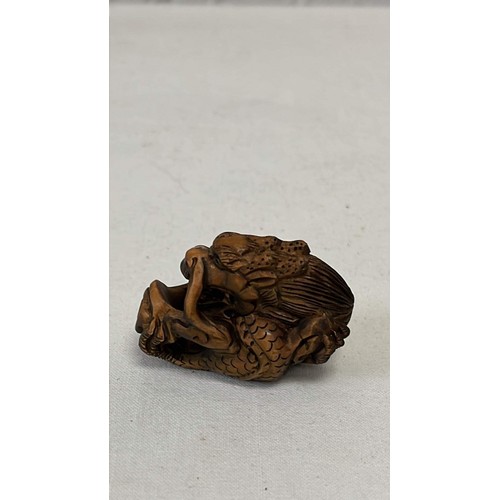 64 - NETSUKE SMALL CARVING SIGNED