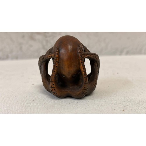 60 - NETSUKE CARVED OCTOPUS SIGNED