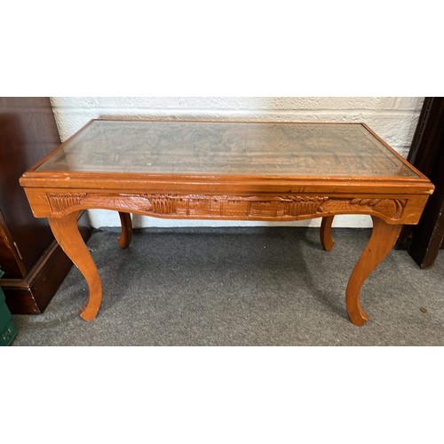 58 - GLASS TOP COFFEE TABLE WITH CARVED DETAIL