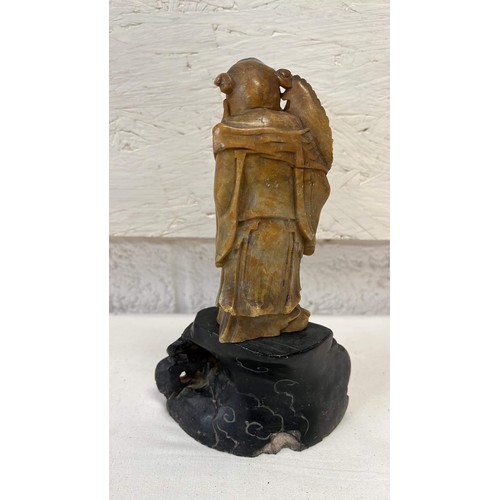 49 - CARVING OF ORIENTAL MONK SMALL CHIP TO BASE