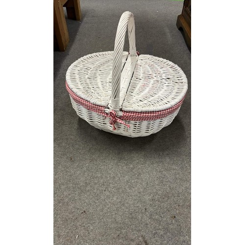 587 - white woven basket with knitting contents