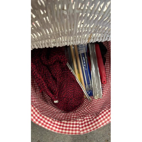 587 - white woven basket with knitting contents