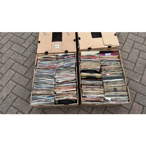 594 - TWO BOXES OF MIXED ARTIST AND MUSIC 45s SINGLES