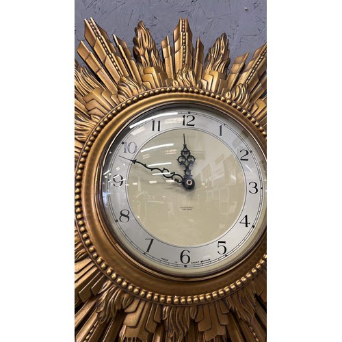 143 - LARGE SUNBURST CLOCK