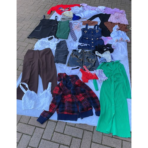 153 - Very large quantity of women's fashion including brand names Calvin Klein