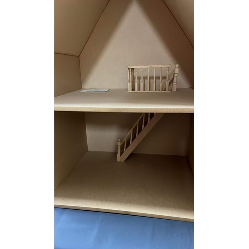 89 - UNUSED DOLLS HOUSE AND BOXED FURNITURE