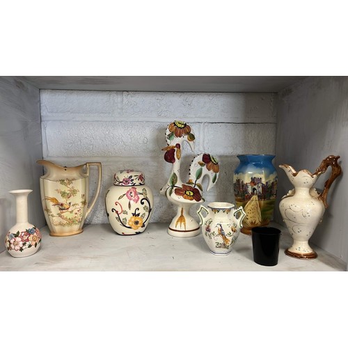 172 - Two shelves of decorative items