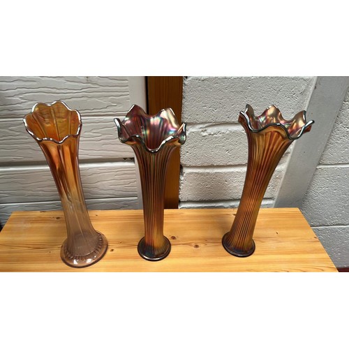 92 - THREE CARNIVAL GLASS VASES