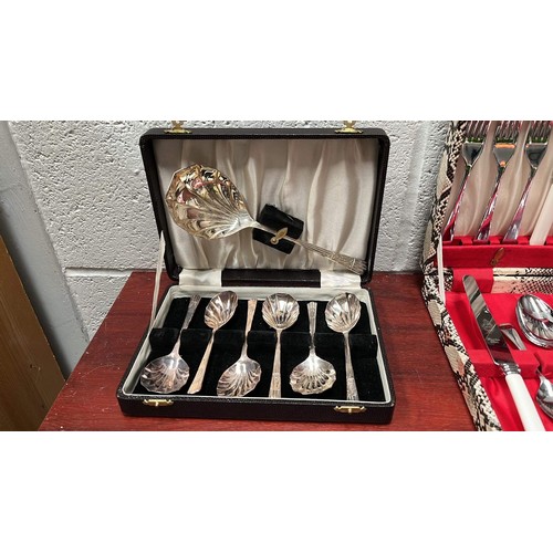 122 - TWO BOXED FLATWARE SETS