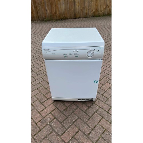 230 - WHITE USED HOTPOINT TUMBLE DRYER BEEN USED IN GARAGE SEE PICTURES