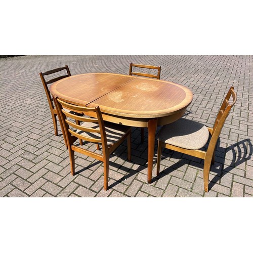 303 - Teak effect dining table and 4 chairs