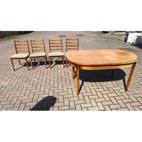 303 - Teak effect dining table and 4 chairs