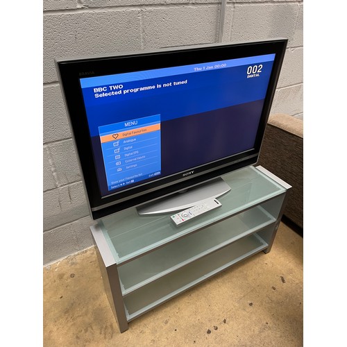 223A - Sony TV on stand - working