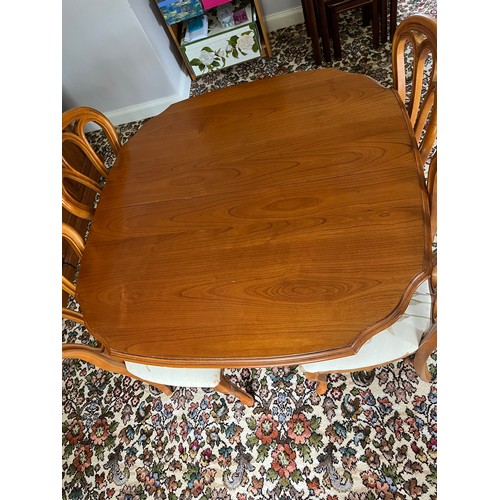 62 - CHERRY FINISH TABLE AND FOUR CHAIRS BY YOUNGER FURNITURE