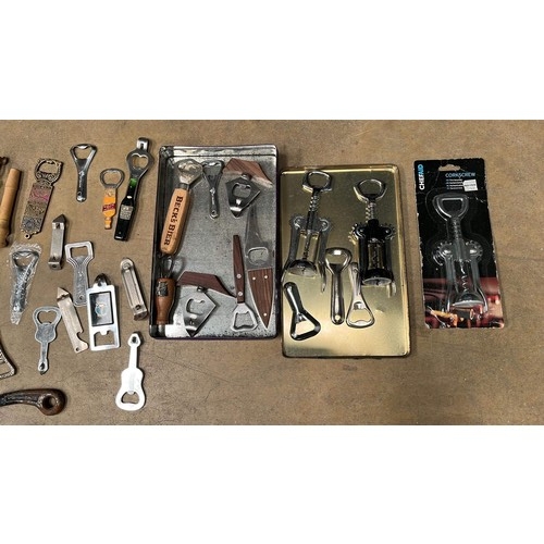 215 - LARGE COLLECTION OF CORK SCREW AND BOTTLE OPENERS