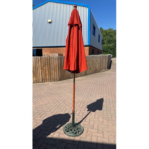 291 - ORANGE PARASOL WITH CAST STAND