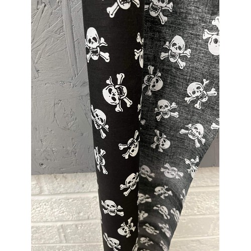 122 - END OF ROLL SKULL AND CROSS BONE MATERIAL IN BLACK