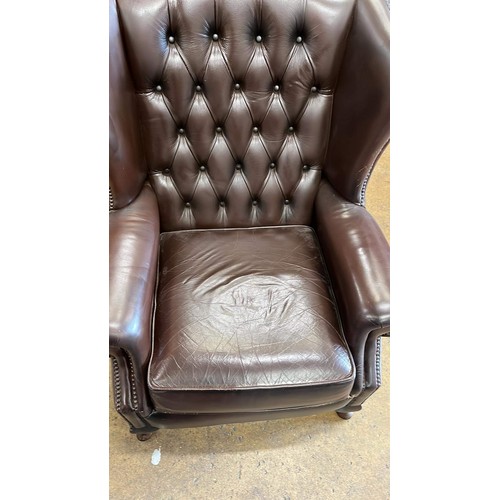 320 - BROWN LEATHER BUTTON BACK ARM CHAIR DOES HAVE WARE MARKS SEE PICTURES