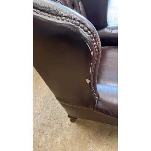 320 - BROWN LEATHER BUTTON BACK ARM CHAIR DOES HAVE WARE MARKS SEE PICTURES