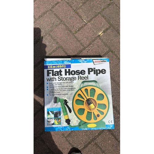 48 - FLAT GARDEN HOSE IN BOX