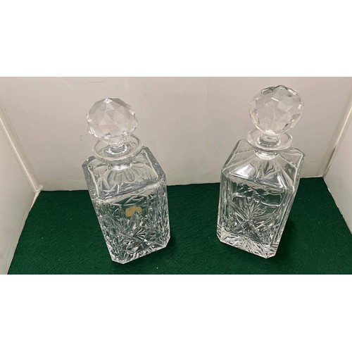 613 - TWO SQUARE WHISKY DECANTERS